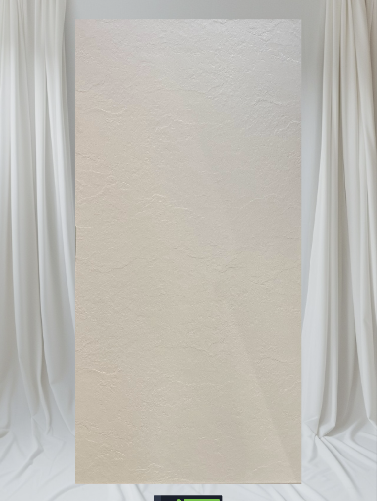 Large-format Venetian plaster effect tile in soft off-white with a textured render finish